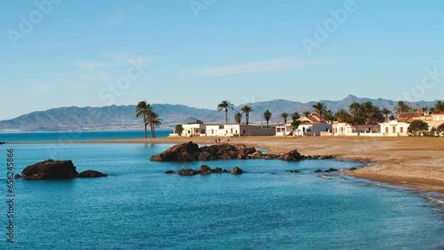 beautiful beach, palm tree and village- Mediterranean Sea in Spain- Costa tropical, Andalusia