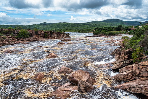 Donana Waterfall in Paraguassu River with dark waters in Andarai, Chapada Diamantina, Bahia in Brazil photo