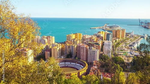 Malaga and the bull fighting plaza or Plaza de Toros - time lapse
