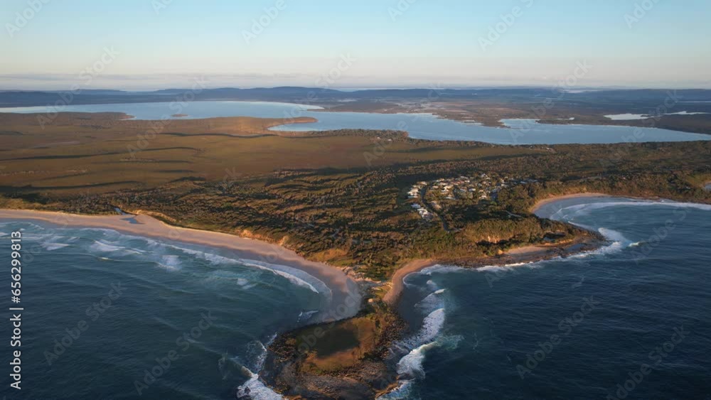 Scenic Landscape Of Angourie Point And Ocean In Angourie, NSW, Australia - aerial drone shot Scenic Landscape Of Angourie Point And Ocean In Angourie, NSW, Australia - aerial drone shot
