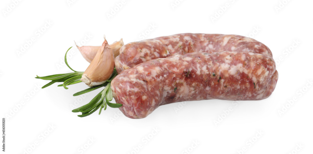 Raw homemade sausages, rosemary and garlic isolated on white
