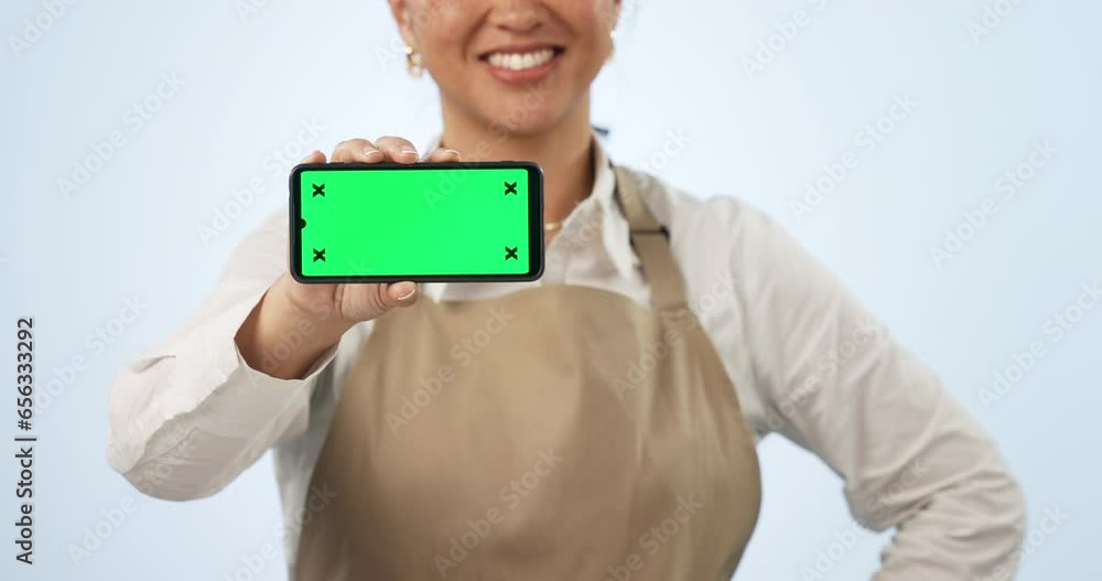 Happy woman, hands and phone green screen in advertising, marketing or cafe against a studio background. Closeup of female person or small business waitress showing smartphone app, display or mockup Happy woman, hands and phone green screen in advertising, marketing or cafe against a studio background. Closeup of female person or small business waitress showing smartphone app, display or mockup
