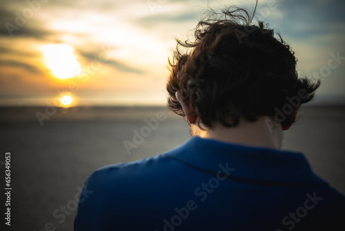 person watching sunset