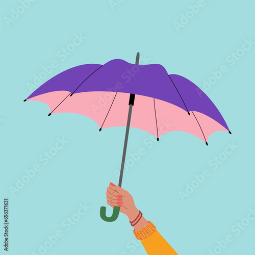Female hand holding open colorful umbrella. Symbol of protection and security. Hand drawn vector illustration isolated on blue background, modern flat cartoon style.