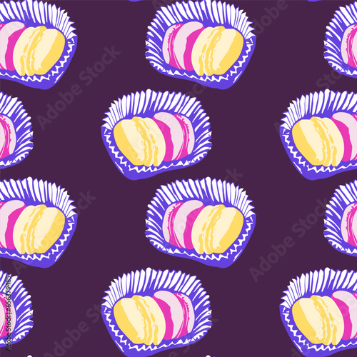 Seamless, endless pattern with macaroons on violet background. French sweets. Colorful macaroons. 