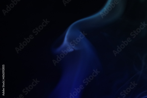 Blue smoke on a dark background, fog pattern, detailed smoke shapes 