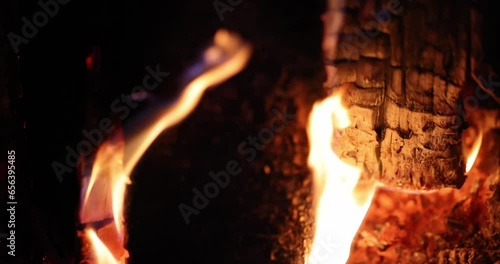 Burning smoldering wood and coals in fireplace. Cooking in natural grill concept photo