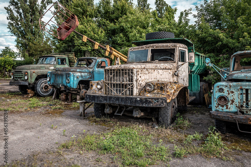 Old wrecked trucks in abandoned place