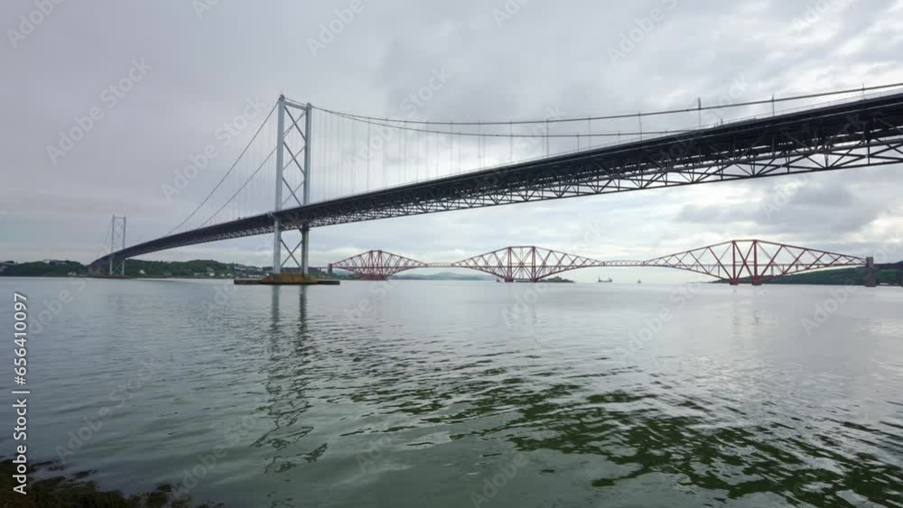 Panoramic view of the suspension bridge across the Firth of Forth in Edinburgh, Scotland. Panoramic view of the suspension bridge across the Firth of Forth in Edinburgh, Scotland.