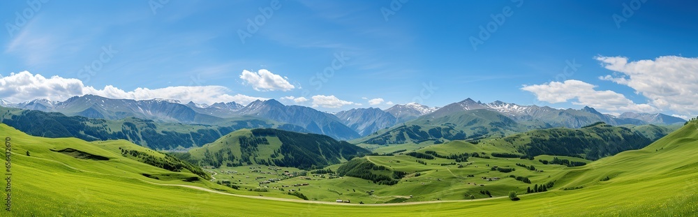 panorama of mountains with green meadows and blue sky during the day.