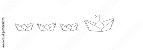 One continuous line drawing of paper boat. Business group leadership success concept represented by origami boats with leader in simple linear style. Editable stroke. Doodle vector illustration