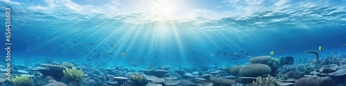 World ocean wildlife landscape, sunlight through water surface with coral reef on the ocean floor, natural scene. Abstract underwater background