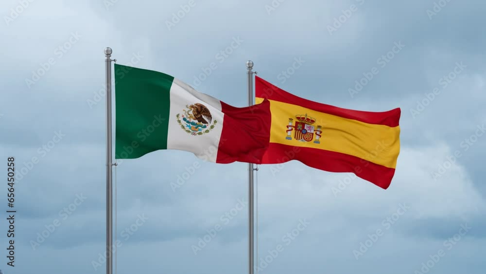 Spain and Mexico flag waving together on cloudy sky, endless seamless loop, two country cooperation concept Spain and Mexico flag waving together on cloudy sky, endless seamless loop, two country cooperation concept