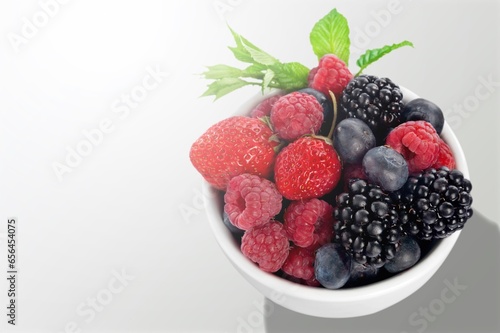 Colorful tasty fresh berry Salad in bowl