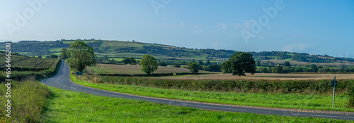 Panoramic view across English farmland on sunny autumn day,