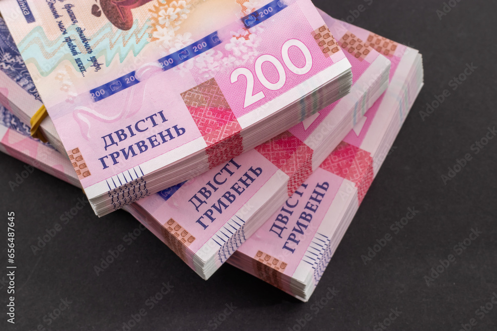 Stack of ukrainian money hryvnia. grivna, hryvna with 200 banknotes Stock Photo Adobe Stock