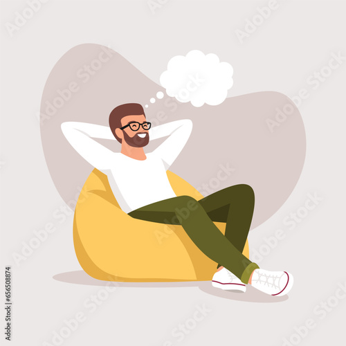 Vector illustration. A young man lies or sits on an ottoman and dreams