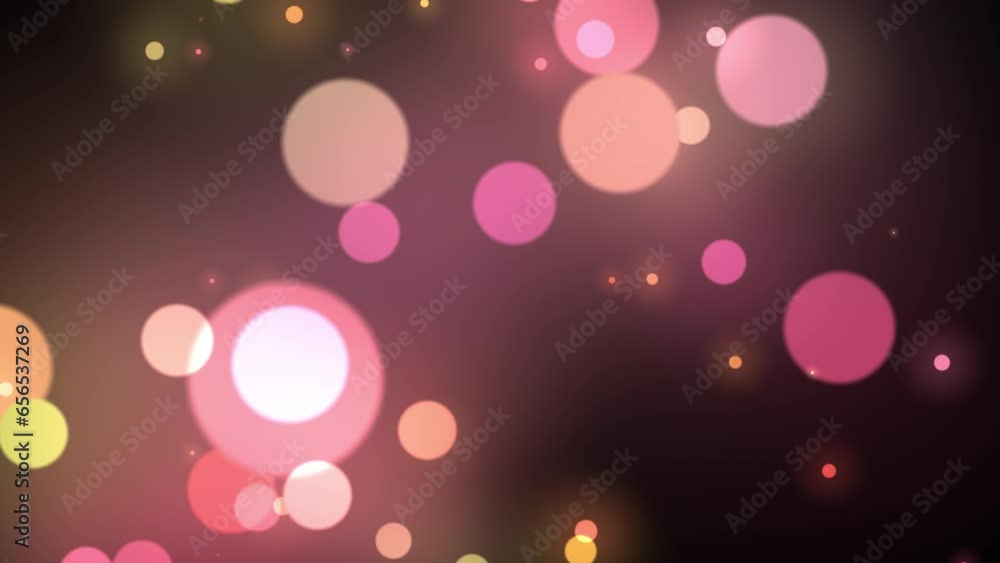 Blurred pink and yellow shimmering particles background. Bokeh colorful lights floating on dark background. 4k loop video animation. Blurred pink and yellow shimmering particles background. Bokeh colorful lights floating on dark background. 4k loop video animation.