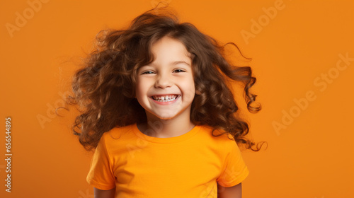 Happy girl kid isolated on studio background © Ricardo Costa
