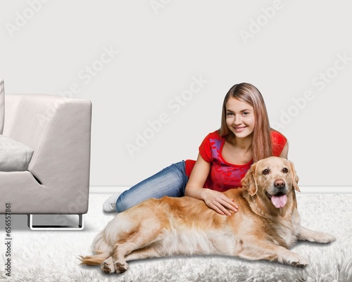 Happy young woman with cute dog