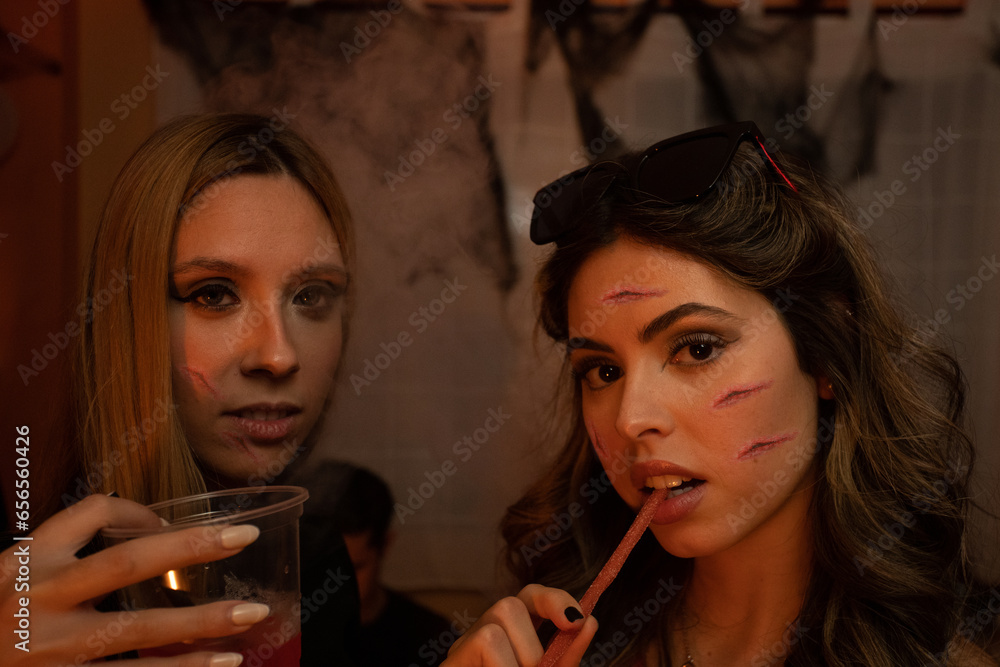 Φωτογραφία European Halloween party in a friends apartment- -Images of Young adults celebrating Halloween