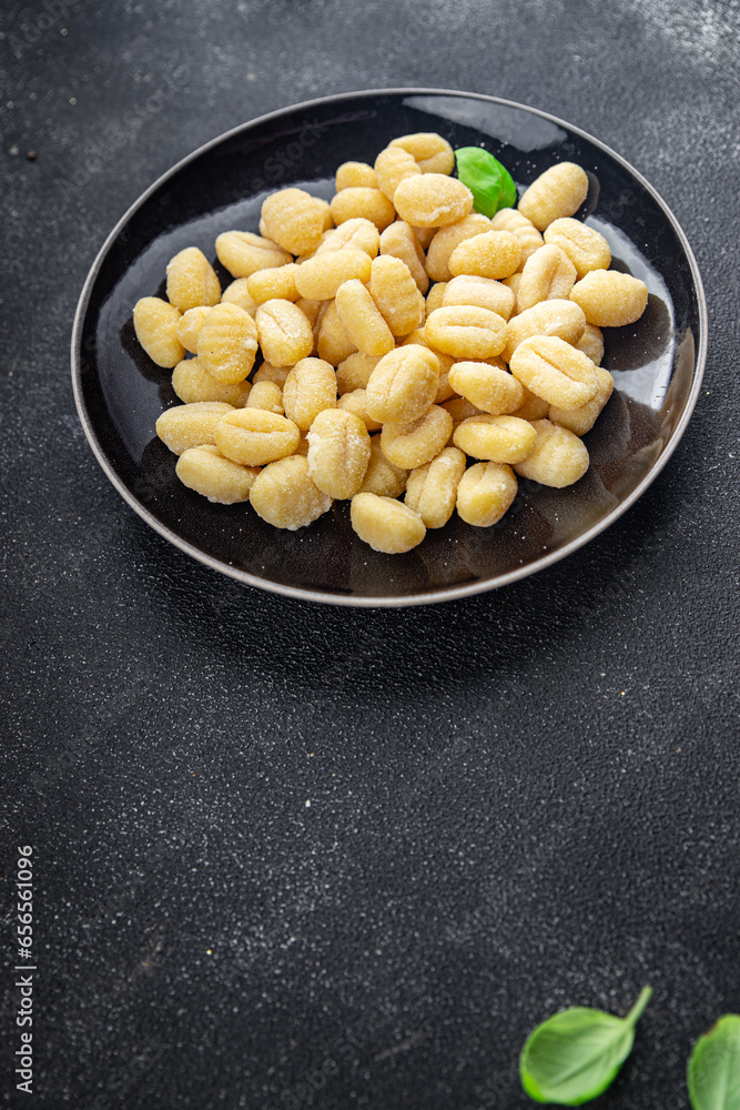 gnocchi raw food potato snack meal food on the table copy space food background rustic top view gnocchi raw food potato snack meal food on the table copy space food background rustic top view