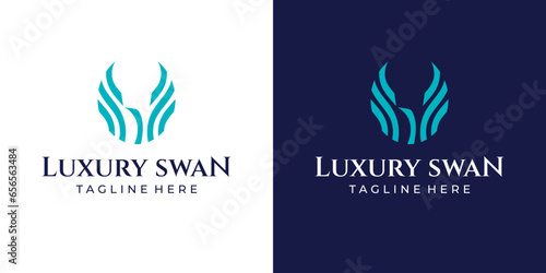 Fototapeta Naklejka Na Ścianę i Meble -  Luxury Swan Abstract Logo Head and Wings.