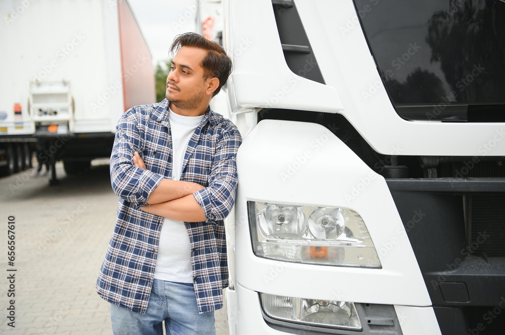 Portrait of confident indian truck driver on parking. Copy space Portrait of confident indian truck driver on parking. Copy space