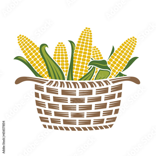 basket with corn cobs isolated on white background