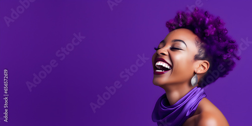 Colorful studio portrait of an ethnic woman smiling happily. Bold, vibrant and minimalist. Copy space photo