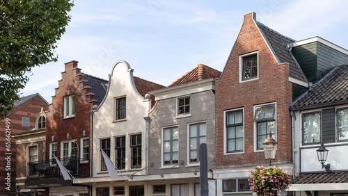Various facades of houses on the village square of the South Holland village of Stolwijk. © Jan van der Wolf