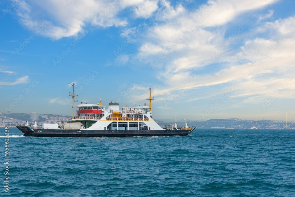 Ferry ship for transporting land transport cars and buses as well as people passengers.