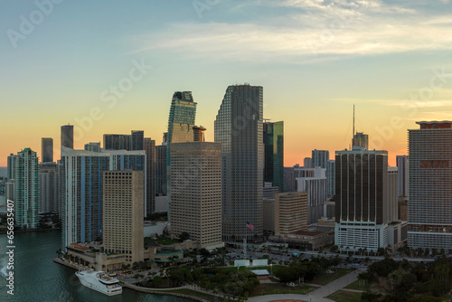 Aerial view of downtown district of of Miami Brickell in Florida, USA at sunset. High commercial and residential skyscraper buildings in modern american megapolis © bilanol