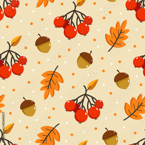 Vector seamless pattern with autumn leaves and red berries and acorns, textile design for fall season