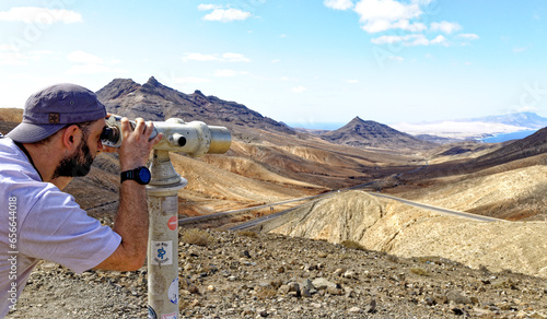 Tourist observing the landscape - Fuerteventura photo