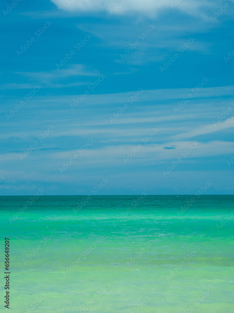 Obraz premium Landscape beautiful summer vertical front view tropical sea beach white sand clean and blue sky background calm Nature ocean wave water nobody travel at Sai Kaew Beach thailand Chonburi sun day time