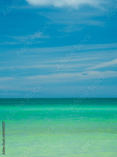 Landscape beautiful summer vertical front view tropical sea beach white sand clean and blue sky background calm Nature ocean wave water nobody travel at Sai Kaew Beach thailand Chonburi sun day time © SingH