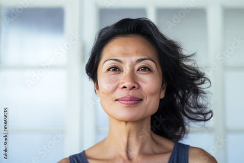 a beautiful asian mid age woman portrait