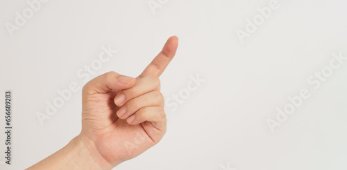 Te hand sign (pitch) or the sensitive tone on white background .The sign of tone in key photo