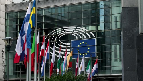 European Parliament headquarters. Flags and states flags flying euro statues farmers protest. European elections