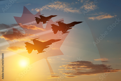 Air Force Day. Aircraft silhouettes on background of sunset with a transparent Canadian flag. photo