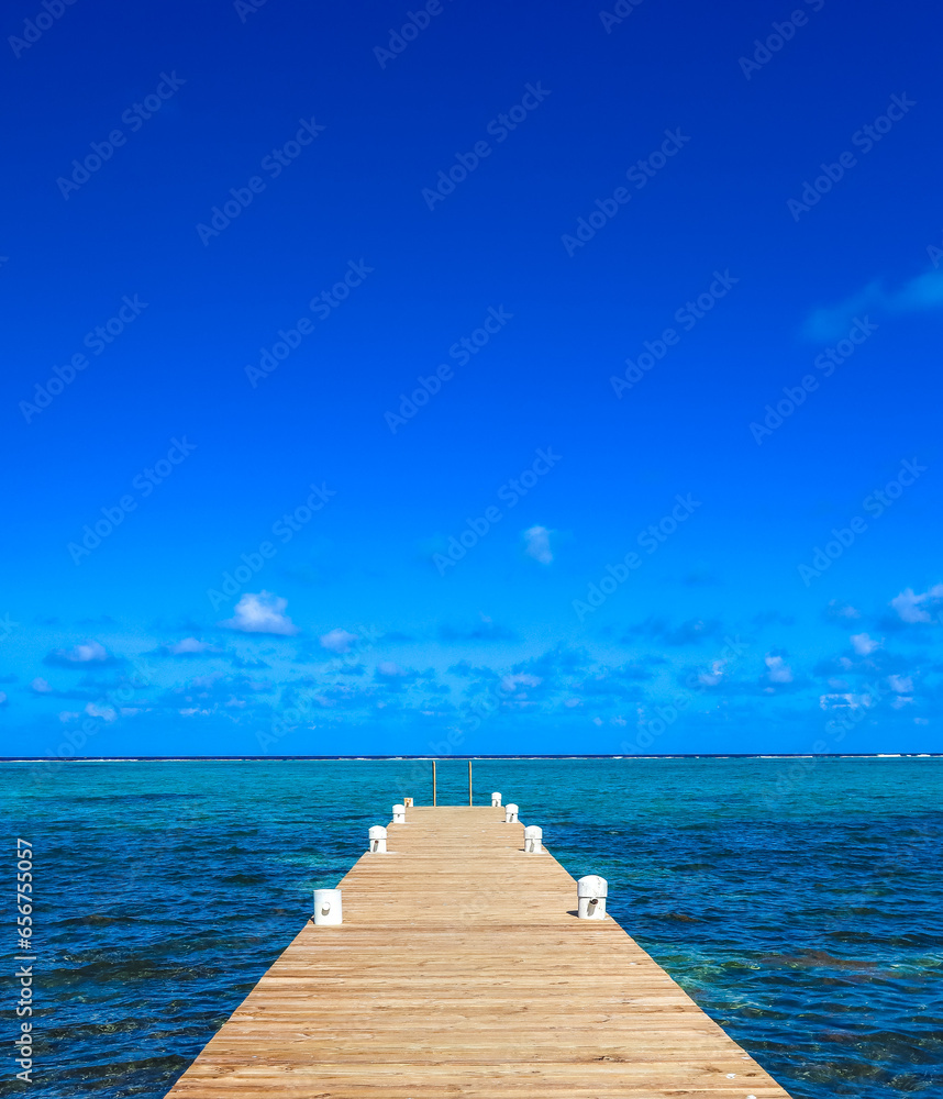 Obraz premium Boardwalk in beautiful Cayman Islands aerial view of Grand Cayman paradise in the Caribbean surrounded by the sea