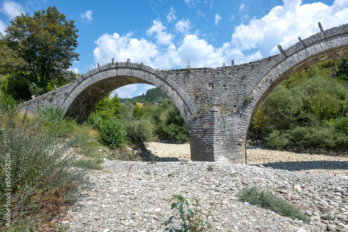 Medieval Plakidas Bridge at Pindus Mountains, Greece photo