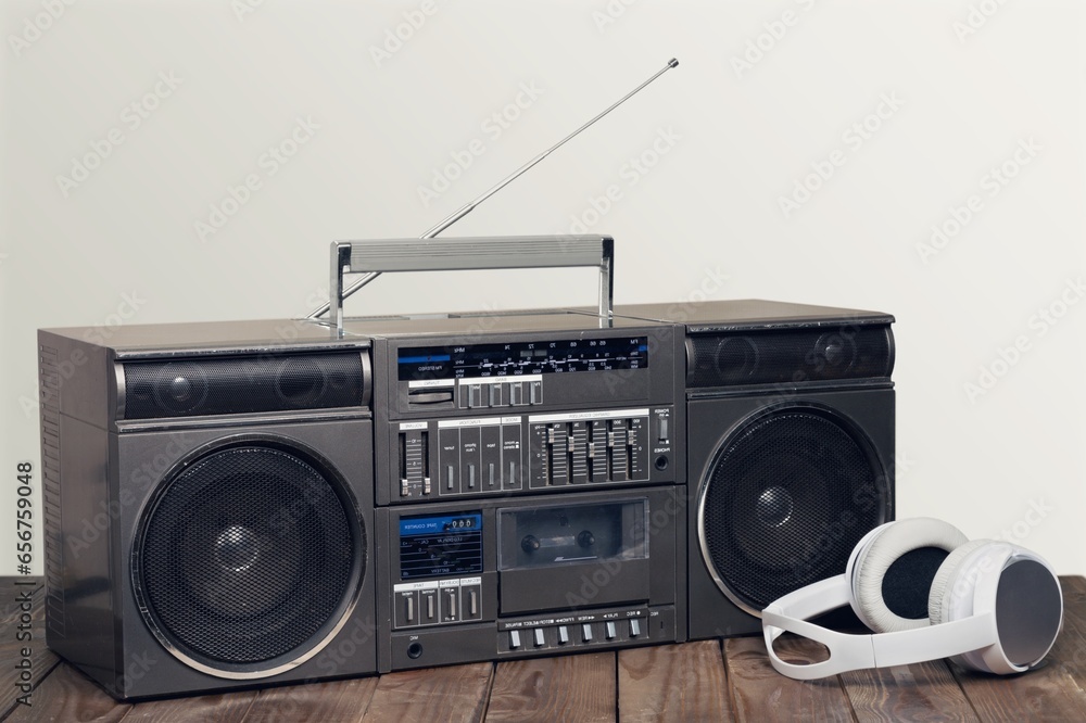 Obraz premium Retro radio or old cassette recorder on desk