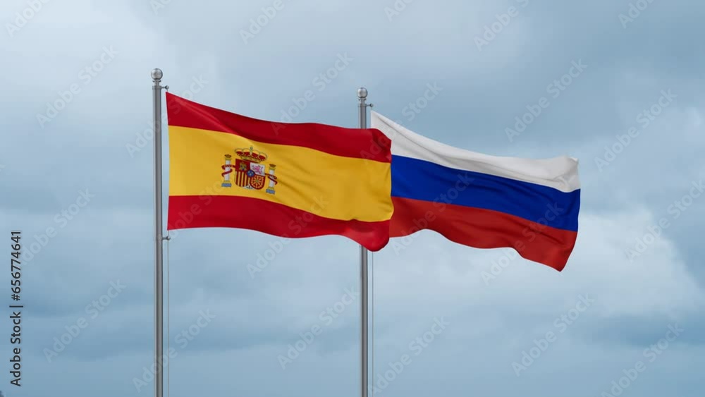Russian Federation and Spain flag waving together on cloudy sky, endless seamless loop Russian Federation and Spain flag waving together on cloudy sky, endless seamless loop