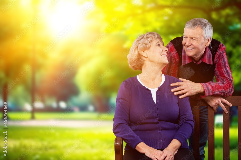 Happy old couple enjoying walking in garden, AI generated image Happy old couple enjoying walking in garden, AI generated image