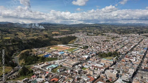 Tulcan is the capital of the province of Carchi located in Ecuador, aerial shot of the town in a sunny day.