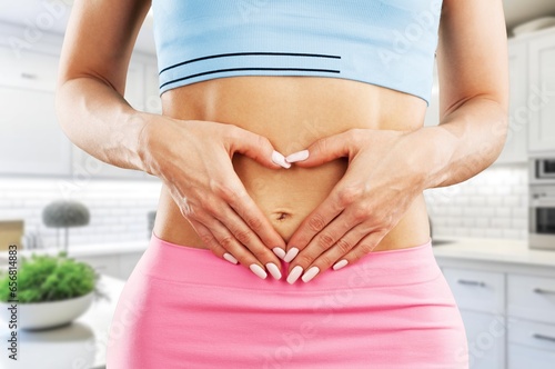 Slim beautiful sporty female stomach
