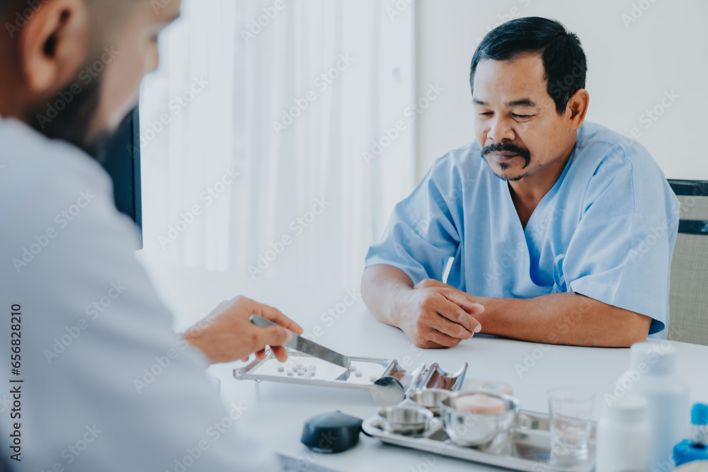 The doctor is explaining the use of medicine. in order to preserve Let the patient understand and receive treatment at the hospital, healthcare and medical concept. The doctor is explaining the use of medicine. in order to preserve Let the patient understand and receive treatment at the hospital, healthcare and medical concept.