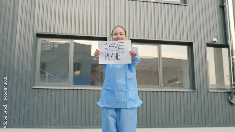 Female Protester Holding a Message 